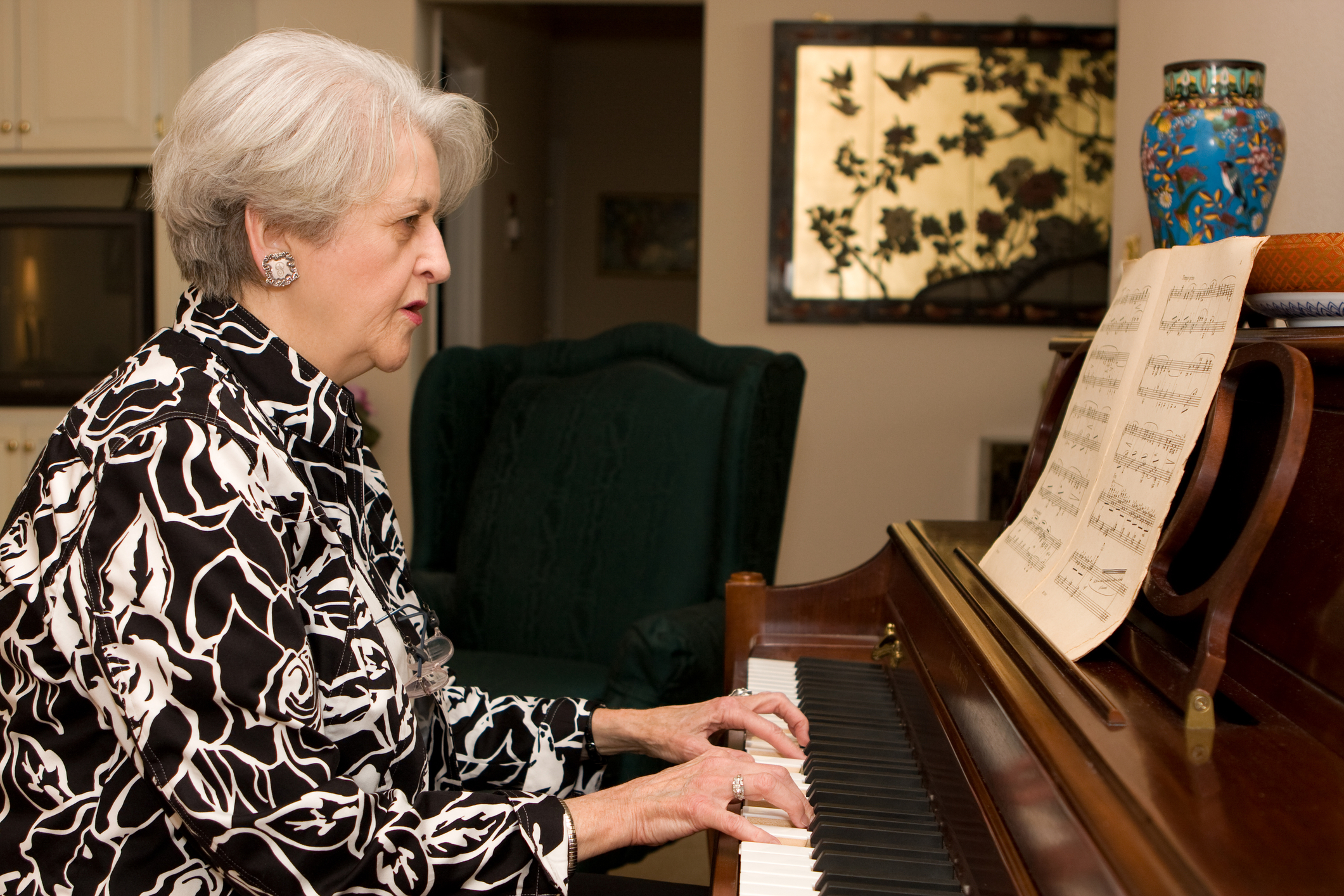 http://www.dreamstime.com/stock-photos-senior-woman-playing-piano-image11729183